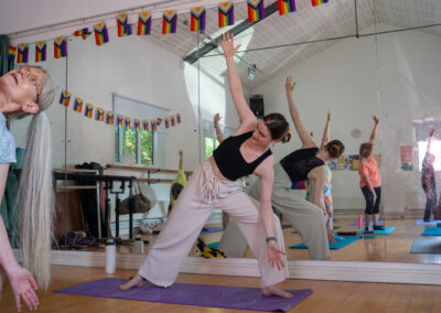 Yoga teacher showing their class a yoga pose